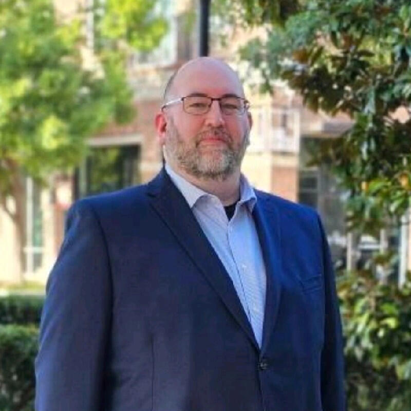 Craig Rothchild, founder of Legacy Architect, standing outdoors