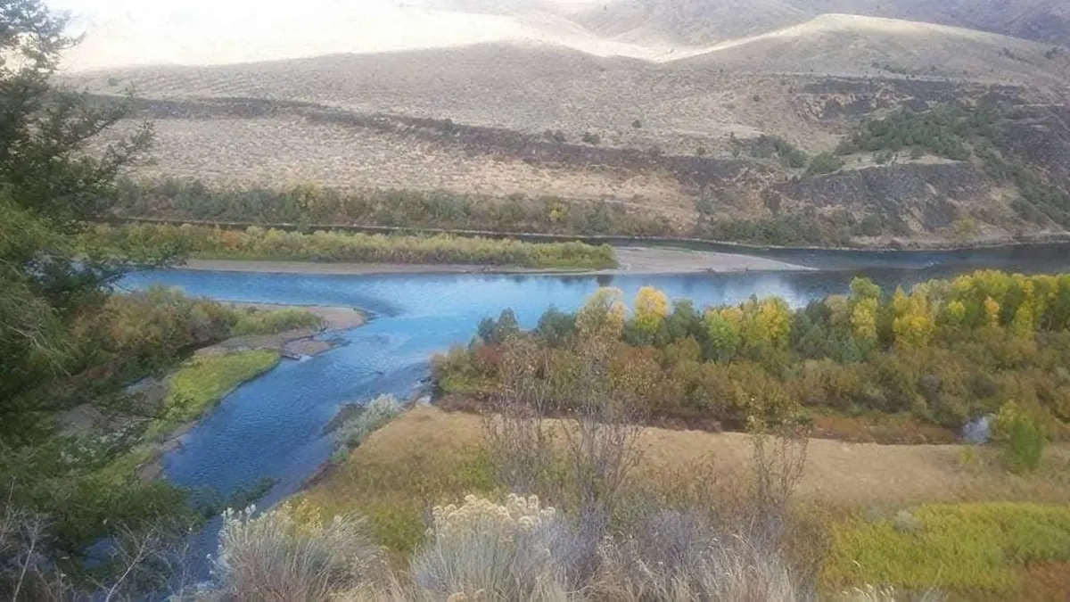 A winding river among trees and hills, photographed by the founder of Legacy Architect RVA